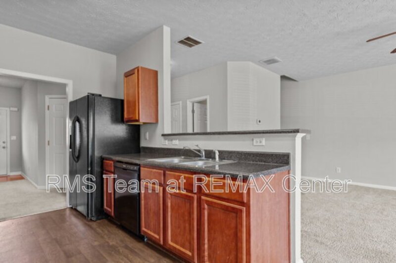 Beautifully maintained end-unit townhome property image